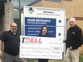 T. Bell Transport owners Jim Laroche and Ted Bell, along with Tasha Rajotte, fleet maintenance manager, presented the Espanola Regional Hospital Foundation with a cheque for $5,000. Terri Noble says the money will go to the Espanola Nursing Home. (PHOTO SUPPLIED)