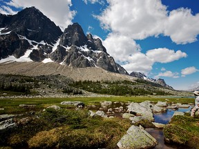 Brian Roth takes in the view of the Rampart Mountains in the Tonquin Valley of Jasper National Park. Known as one of Canada's premier alpine regions, the Tonquin Valley has more than 70 km of trails, and is known as a must do for serious backpackers.