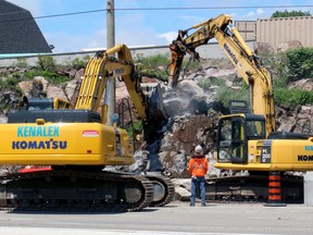 Construction crews remove a rock in the rock wall on Cassells Street at the First Baptist Church, Wednesday. A large chunk of rock fell from the wall in 2017 and work crews decided to remove some more that looked like it was in a precarious position.
PJ Wilson/The Nugget