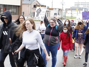 Photo taken during Wednesday's anti-racism demonstration in Timmins. A similar demonstration is planned for Friday at noon. Marchers once again will be walking from the Participark and holding a rally in front of Timmins city hall.

RICHA BHOSALE/The Daily Press