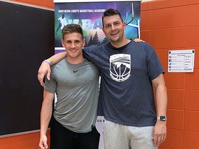 Kyle Beers, head of operations for Northern Lights Basketball Academy, right, poses for a photo with Noah LaPierre, one of his instructors for the summer driveway training program.