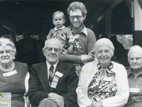 Attendees at the 80th Baker Picnic in 1978 in St. Thomas included Elsie Hart, front left, who had attended the very first reunion, Ainsley Baker, who had attended every gathering, Minnie Williams, oldest person at the 80th reunion, and Annie Fishbach. Glen Williams, back row and holding his daughter, Amanda, was president of the ‘78 picnic. Times-Journal photo from the Elgin County Archives.