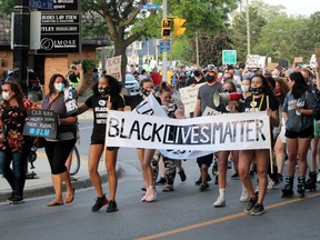 Hundreds of people participate in the Chatham-Kent Supports: Black Lives Matter march Friday, June 5, 2020, in downtown Chatham, Ont. Local organizers billed the event as a call to action to show support for Americans who are protesting police brutality against black people, prompted by the high-profile death of George Floyd, who died after a Minneapolis police officer knelt on his neck for nearly nine minutes. The event was organized to shed light on anti-black racism that exists in Canada. Ellwood Shreve/Chatham Daily News/Postmedia Network