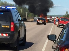 A pick-up truck burst into flames after a collision with a tractor-trailer on Highway 17 in the West Nipissing area.