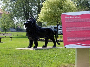 The Gaskin Lion, build to commemorate John Gaskin ,who advocated to create Macdonald Park in 1891, boasts a historical and cultural City of Kingston plaque. (Steph Crosier/The Whig-Standard)