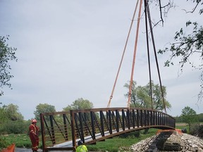 A new Rotary Club of Tara project - a pedestrian bridge over the Sauble River in Tara - opened May 27.