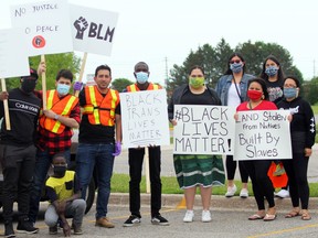 PETER RUICCI/Sault Star
Demonstrators make their feelings known on Sunday as part of the Black Lives Matter Demonstration and Dialogue, held at Algoma University