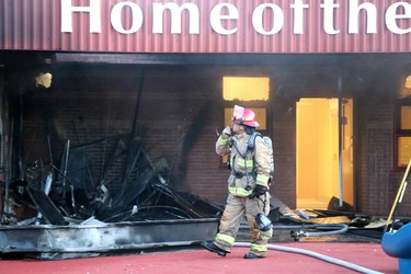 Rob Greve, of Sault Ste. Marie Fire Services, investigates fire at St. Paul Catholic elementary school, 78 Dablon St., in Sault Ste. Marie, Ont., on Tuesday, July 9, 2020.  (BRIAN KELLY/THE SAULT STAR/POSTMEDIA NETWORK)