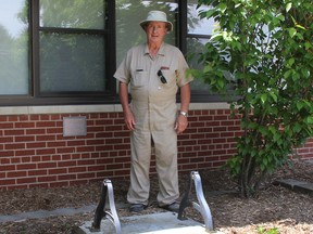 Frank Letourneau stands near the base where the former SS No. 4 Dover school bell was recently stolen from in front of the Pain Court high school. Ellwood Shreve/Postmedia Network