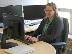 Kristyn Yeck, a public health nurse with Southwestern Public Health, is part of the call centre serving their region of about 210,000 residents. The call centre often serves as the main point of contact with residents who have questions on COVID-19. Greg Colgan/Postmedia Network