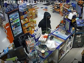 This is an image from a video of a robbery June 10 at a convenience store at Colborne Street West and Oak Street, which was also robbed June 10.