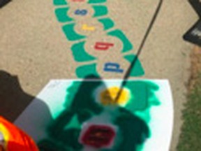 City volunteers create sensory sidewalks, a new addition to Fort Saskatchewan, encouraging play and movement. Photo Supplied.