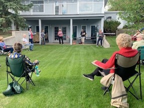 The Social Distance Singers performed a 30-minute concert for Summit Pointe residents on Wednesday evening. The group has sung for local seniors for the past seven weeks during COVID-19 and plans to continue singing for the rest of the summer. Lindsay Morey/News Staff