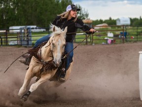 Ashley Mulligan aboard her nine-year-old palomino called Sandman on June 11. Mulligan is participating in the Bring Your Own Barrels, a virtual racing series for barrel racers, and a suitable alternative as the coronavirus continues to rein in the western Canada racing circuit.