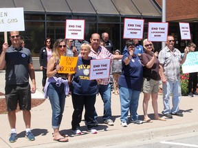 Residents fed up with the restrictions imposed by the COVID-19 pandemic took part in the 'End the Lockdown Chatham-Kent Peaceful Protest for Freedom' in front of the Civic Centre in Chatham on June 13. Ellwood Shreve/Postmedia Network