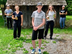 Norfolk County students are stepping up to fill the ever-growing positions in agriculture this summer. Sarah Judd (centre), manager of the Meadow Lynn Market Garden, stands with her four summer students. From left, the students are Kayla Deveries, Leah Erwin, Michelle Lucas, and Emma Scott. Ashley Taylor/Delhi News Record