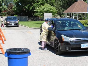 Over 150 people were tested for COVID-19 on June 11, the first day of a three-day mobile, drive-thru testing clinic held at the Wallaceburg site of the Chatham-Kent Health Alliance. (Jake Romphf, Postmedia Network)