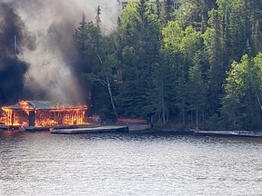 Kenora OPP have one person in custody following a fire on Golf Course Bay.