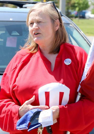 Kathy Humalamaki, president of Unifor Local 1359, speaks to a reporter before a demonstration about pandemic pay premiums near Sault Area Hospital on Wednesday, June 17, 2020. (BRIAN KELLY/THE SAULT STAR/POSTMEDIA NETWORK)