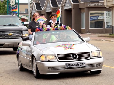 Some teens waved colourful flags while making their way along the roads of Spruce Grove.