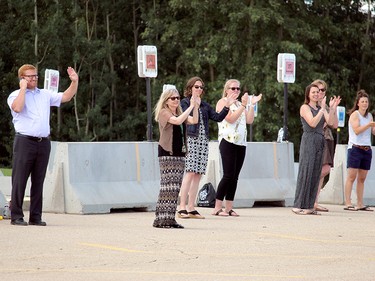 Teachers at Memorial Composite High School in Stony Plain also came out to cheer their students who participated in the site's drive-thru graduation ceremony Tuesday, June 16, 2020.