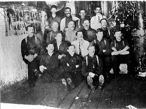 A wartime picture of Nick Sakaliuk and his Ukrainian and other Eastern European fellow internees in Fort Henry, circa 1915. Sakaliuk is sitting on the floor, front left, with his left hand on top of his right. (Supplied Photo)