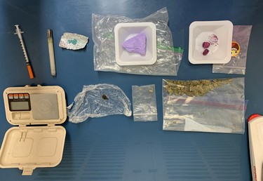The Woodstock police seized multiple weapons and drugs Ð including $27,000 in fentanyl Ð early Saturday morning after they received a report of a passed out man behind the wheel of his car in a parking lot. The 39-year-old man is facing multiple charges.

Handout