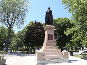 Protesters gathered to demand that the City of Kingston remove a statue of Sir John A. Macdonald from City Park on Saturday, June 20, 2020. Meghan Balogh/The Whig-Standard/Postmedia Network