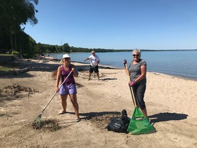 Members of the Port Elgin Beach Preservers, including Patti Bowman (left), Wayne McGrath, and Lorna Reynolds staged a clean up at the south end of Port Elgin Main Beach June 16, one of many groups and families that will help spruce up the local Lake Huron shoreline until the end of June.