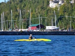 Tobin Day paddles with friends in Colpoys Bay, adding kilometres to Team Trans-Canada and donations for the 2020 Virtual Hike for Hospice campaign.
(supplied photo)