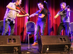 The Schryer Triplets, with Pierre Schryer, Louis Schryer and Daniel Schryer, participate in a soundcheck befiore a reunion concert at The Tech in Sault Ste. Marie, Ont., on Friday, April 13, 2018. (BRIAN KELLY/THE SAULT STAR/POSTMEDIA NETWORK)