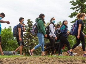 The Composite High School Interact Club trekked six k.m. each carrying six litres of water on their backs to emulate the efforts of many who experience water shortages. Attempting to raise awareness and funds for schools in Roatan, Honduras, the team hopes the community, Through June 28 will also come out to Walk for Water.