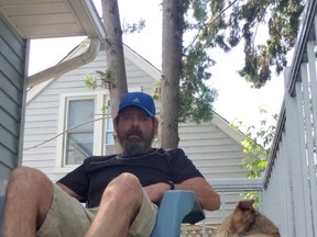 Mike Pinch says his rescue dog, Abby, saved his life after he suffered a major heart attack, June 14. Pinch was sleeping during his heart attack and woke up after his dog began licking his face. Submitted Photo