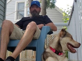 Mike Pinch says his rescue dog, Abby, saved his life after he suffered a major heart attack. Pinch was sleeping during his heart attack and woke up after his dog began licking his face. Submitted Photo