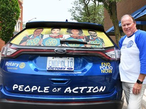 Don "Sparky" Leonard, the district governor for Rotary District 6380, is shown next to his Rotary-themed vehicle in downtown Chatham on July 8, 2019. He will finish his term in the role at the end of June. (Tom Morrison/Postmedia Network)