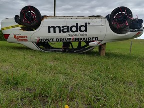 A rolled-over vehicle warning against impaired driving is now on display near the intersection of Highway 43 and Range Road 51.