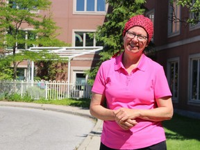 Nurse practitioner Corinne Pollard stands outside Vision Nursing Home in Sarnia on June 16. She's one of the workers being praised for their efforts during a COVID-19 outbreak at the home. Paul Morden/Postmedia Network