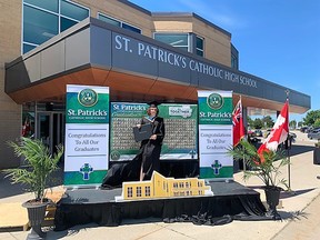 Graduating St. Patrick’s Catholic High School student Jackie Lussier appears on the drive-up stage during the school’s first-ever virtual graduation on June 14. Handout/Sarnia This Week