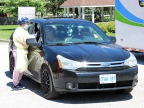 Over 450 people received a COVID-19 swab test during the mobile drive-thru clinic at the Chatham-Kent Health Alliance's Wallaceburg site in Wallaceburg, Ont., on June 11-13, 2020. (Jake Romphf/Postmedia Network)