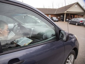 Organizers of Dresden’s Sunday Evening in the Park say they’re hopeful part of the season can be salvaged, but probably with services not before early August. File photo shows church members participating in a drive-in church service in Alymer this past spring. File photo/Postmedia Network