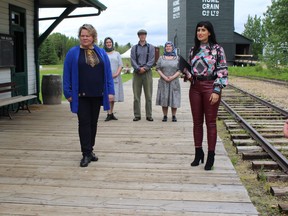 Fort Saskatchewan - Vegreville MLA Jackie Armstrong-Homeniuk and Minister of Culture, Multiculturalism and Status of Women, Leela Sharon Aheer, announced the re-opening of the Ukrainian Cultural Heritage Village in Lamont on June 21, alongside staff. JENNIFER HAMILTON / THE RECORD