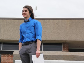 Ethan Bender was among close to 160 graduates who participated in a drive-thru graduation ceremony Thursday at Widdifield Secondary School. Bender is also the final graduating class at Widdifield. The high school will permanently close its doors this month.