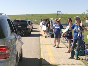 Muir Lake School teachers bid farewell to students during a parade on June 19 at 10 a.m.

There was a very good turnout with many vehicles decorated with signs to teachers, and lots of tears and smiles.