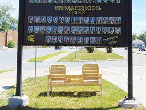 Photo by Helen Morley/For The Mid-North MonitorA banner placed just under the Espanola High School sign features the graduating class of 2019-2020.