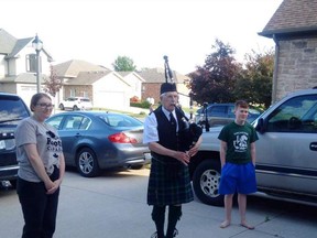 Graduates Emily and Ross Killen, with visiting piper Robert Ross seeing them into their next chapter. For Emily, it’s pursuing a nursing degree after completing high school, and for brother Ross, graduating grade 8. Photo submission Deborah Killen