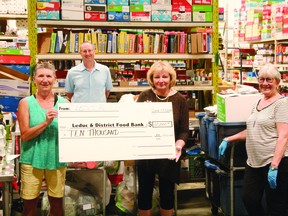 Irene Hanson, senior material coordinator for Ledcor Industries (left), stopped by the Leduc & District Food Bank on June 19 to drop off a donation of $10,000. (Alex Boates)