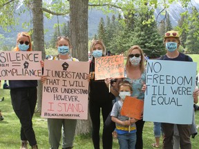 Canmore vigil for local Black, Indigenous, and People of Colour (BIPOC) community and BIPOC communities around the world took place on June 5. People brought signs and a peaceful march from Riverside Park on the road through downtown to Centennial Park was held. Photos Marie Conboy/ Postmedia.