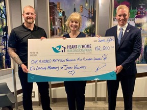 John WilliamÕs family (pictured left to right): Brad Williams, Heather Williams and Ryan Williams present a $152,500 cheque in memory of the former Quinte West mayor.
SUBMITTED PHOTO