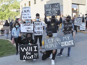 From left to right, KaziaÊBailey, Courtney Bailey, Kya Bailey, Chantelle Edwards,ÊJewelleÊEdwards, Gabrielle Edwards andÊDanielle EdwardsÊ were among the hundreds who marched through downtown Belleville Sunday evening for a Black Lives Matter rally.VIRGINIA CLINTON