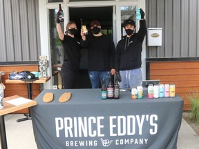 Staff at Prince EddyÕs Brewing Company in Picton were ready for the large crowd of people who came out to sample the cold products on the weekend. Bars and restaurants were allowed to open outddor patios across the Quinte region beginning on Friday. Pictured (from left) are Prince EddyÕs staff members, Morgan Clarke, Gavin Kramer and David Nurse. BRUCE BELL